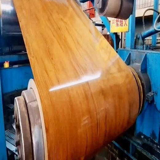 le grain en bois de 914mm a enduit le Galvalume d'une première couche de peinture la bobine qu'en acier pour faire la bande froide a soudé des tuyaux